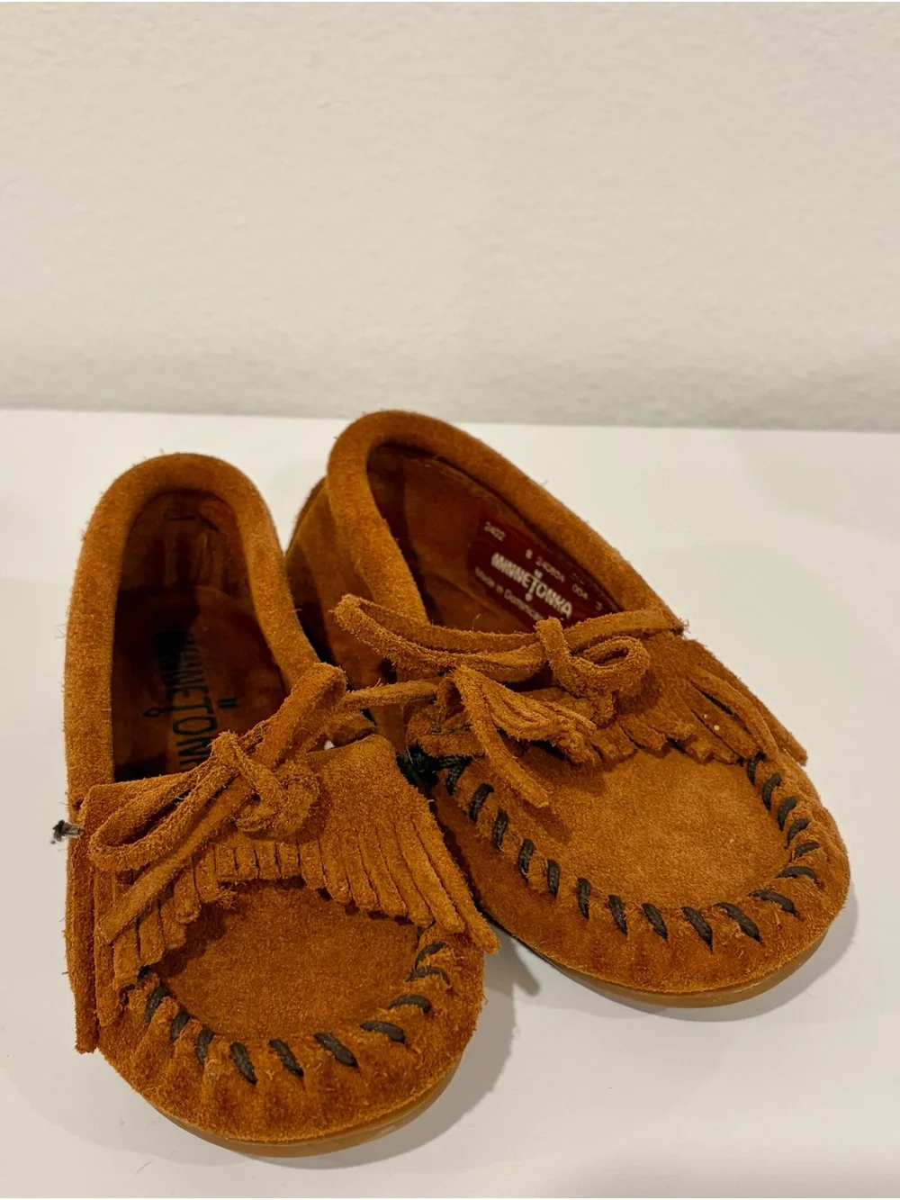 Authentic Minnetonka toddler size 8 Suede Fringe Moccasins - Cognac Brown